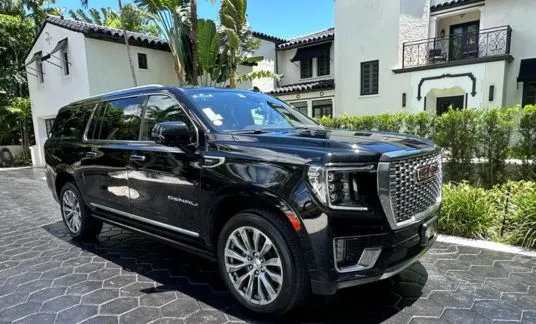 Professional private chauffeur service with luxury vehicle in Miami